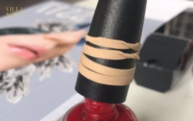 Use a Rubber Grip Open nail polish bottle